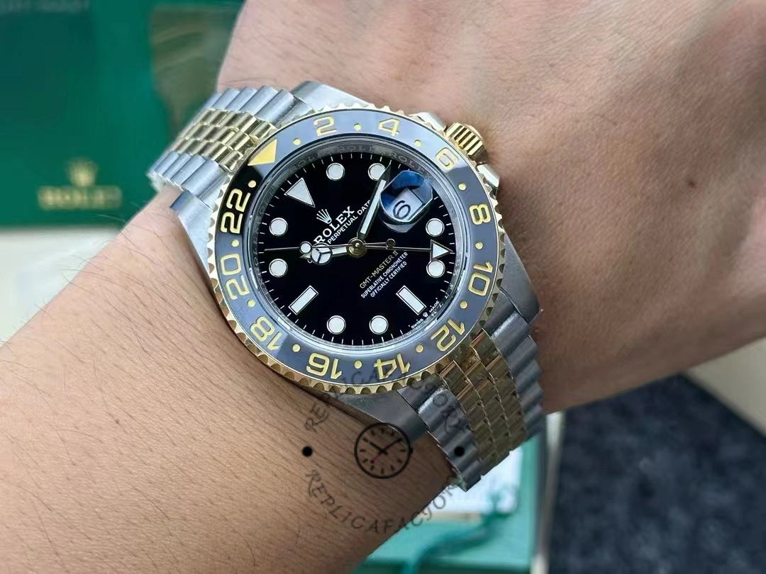 Wrist shot of Rolex GMT-Master II 126713GRNR-0001 showing two-tone steel and gold case.