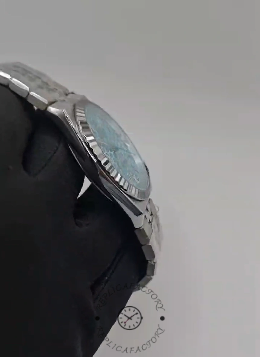 Side angle of Rolex Land-Dweller 36 M127236-0001 Replica highlighting case curvature and lugs.