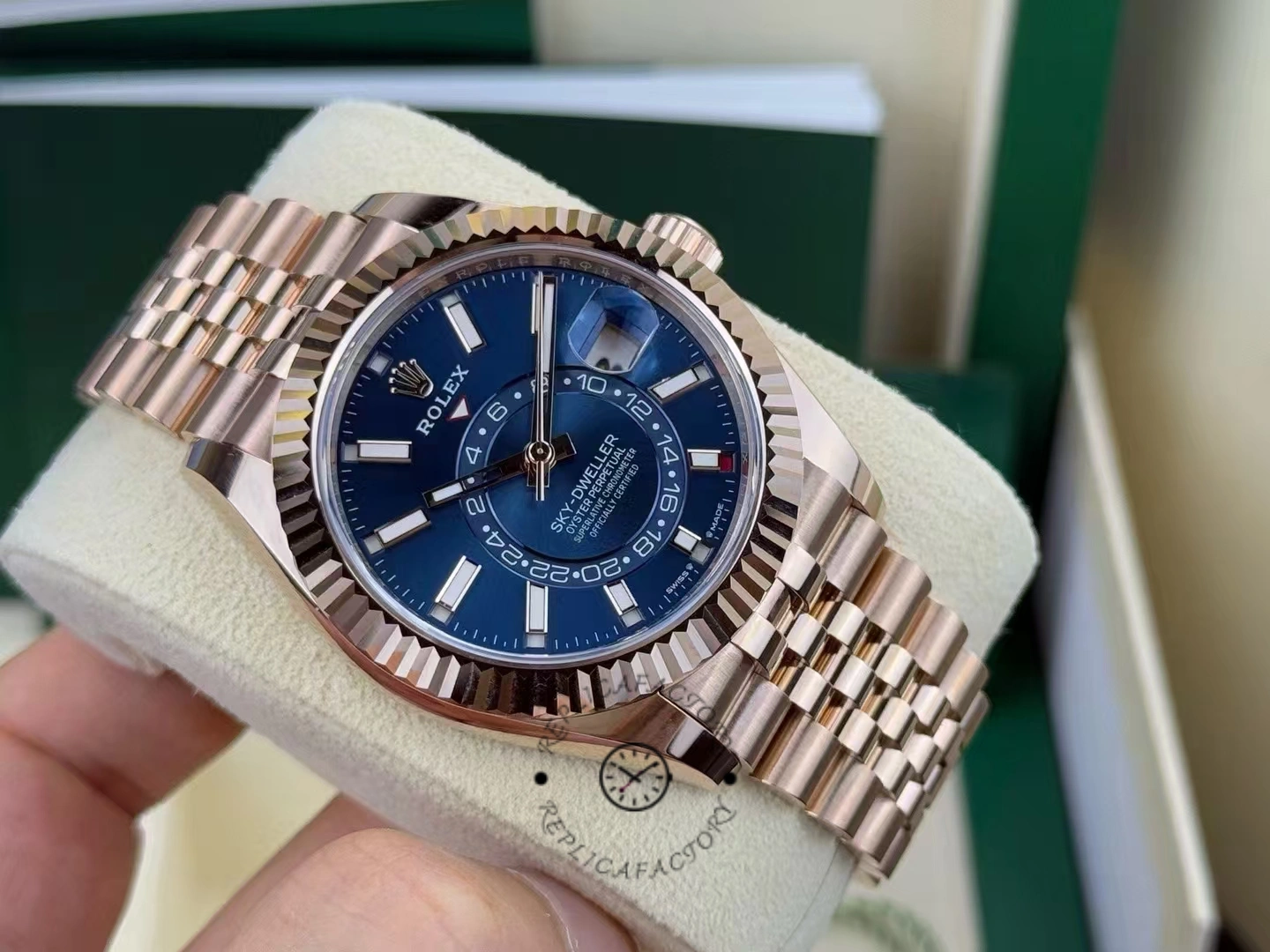 Handheld angled view of the Rolex Sky-Dweller m336935 0005 showing case profile and dial.