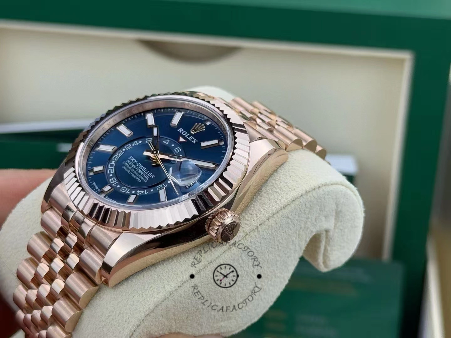 Angled view of the Rolex Sky-Dweller m336935 0005 on cushion, dial and bracelet visible.