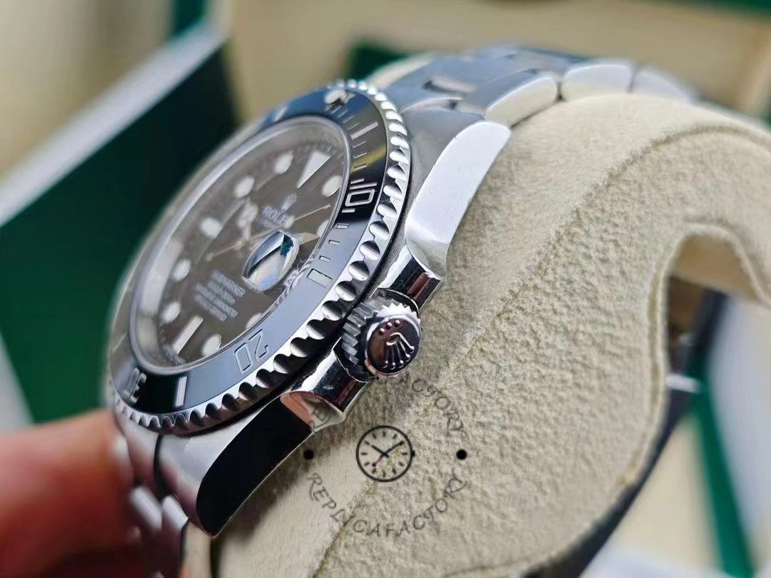 Crown side view of Rolex Submariner Date 126610LN showing engraved Rolex crown logo.