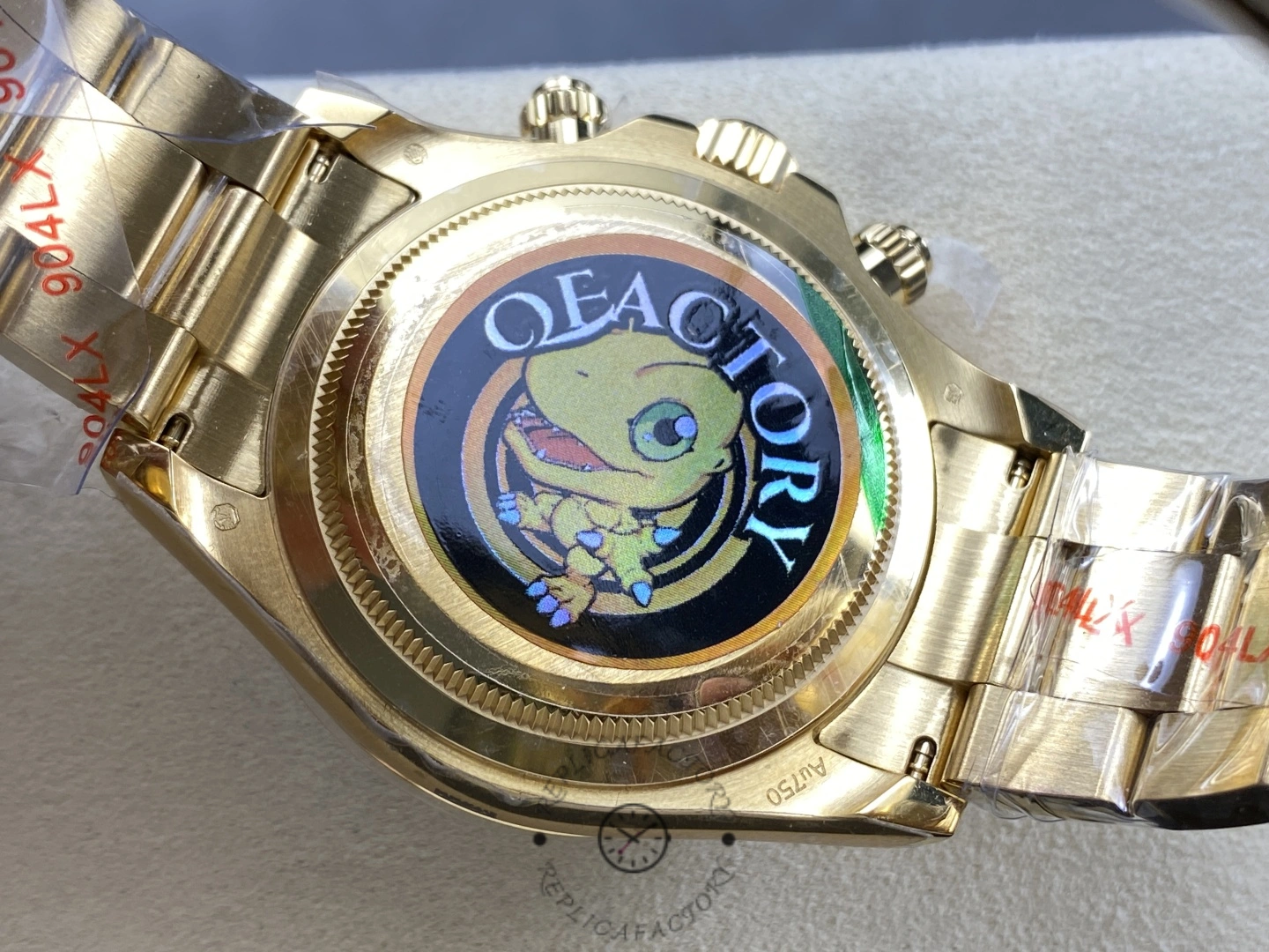 Caseback view of 2025 Rolex Cosmograph Daytona 126508 0008, yellow gold back and bracelet end links.