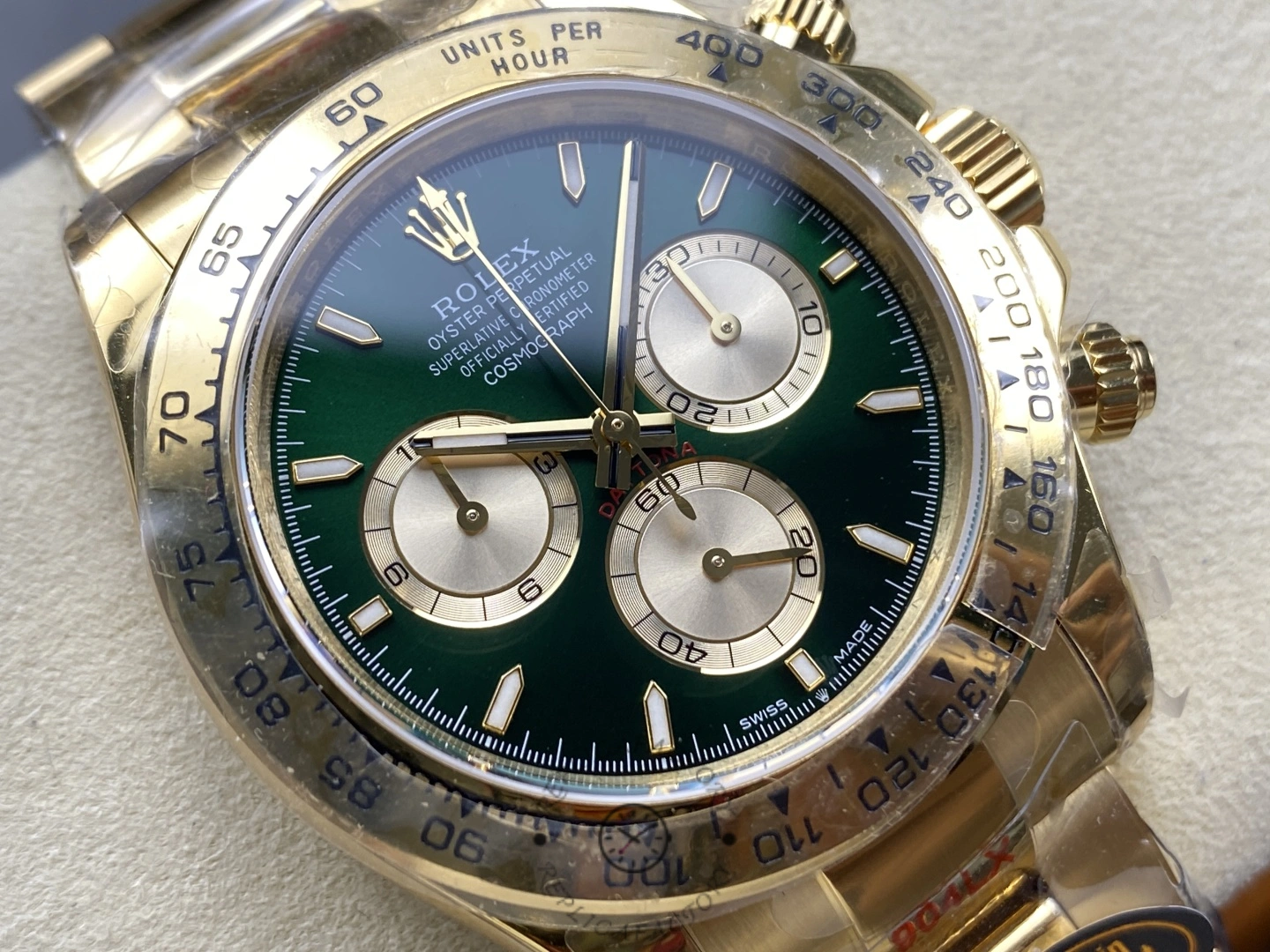 Dial close-up of 2025 Rolex Cosmograph Daytona 126508 0008, green dial with chronograph subdials.