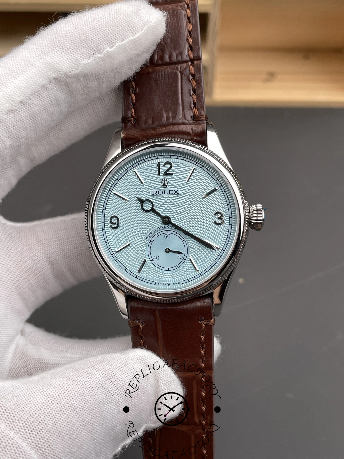 Close-up of the Rolex 1908 52506-0002 dial with Arabic numerals and small seconds subdial.