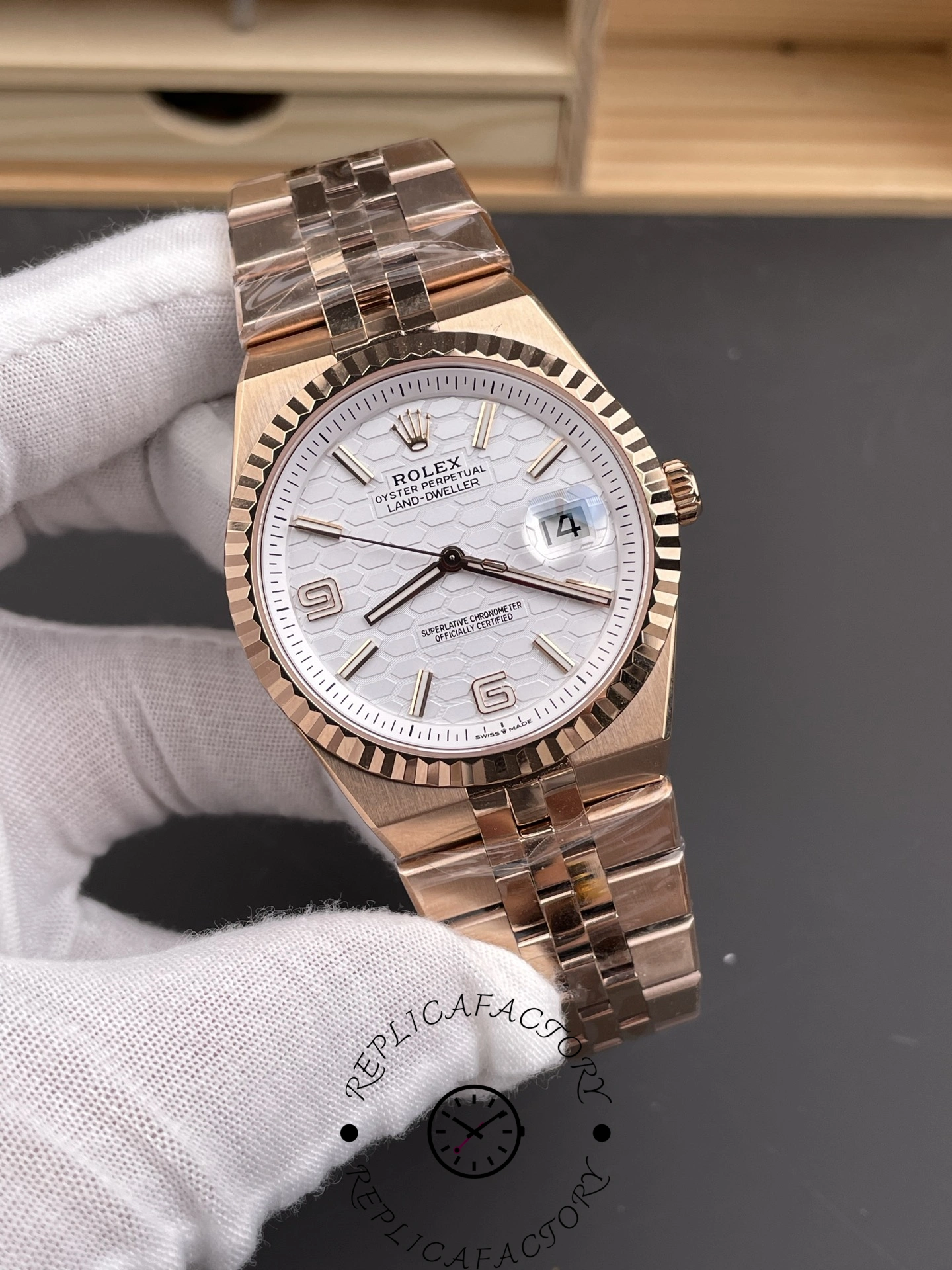 Angled front view of Rolex Land-Dweller M127235-0001 Replica with Roman numeral markers and polished case.