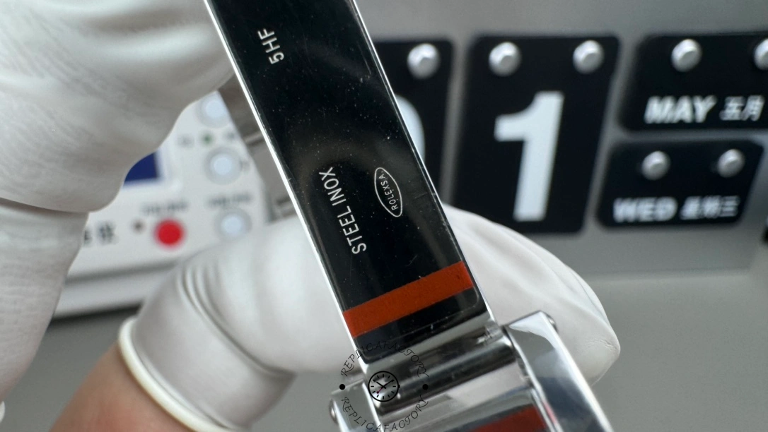 Rolex Submariner 116610LV, clasp and bracelet side detail with protective strip.