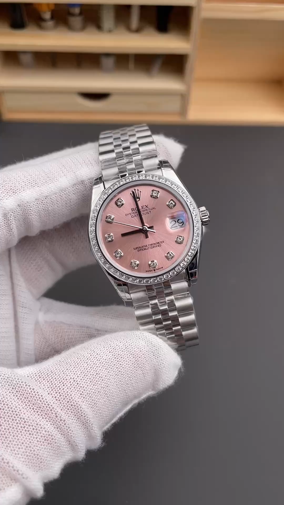 Video image of Rolex Datejust 31 m278384rbr-0036 showing the pink dial and diamond-style bezel. - Video