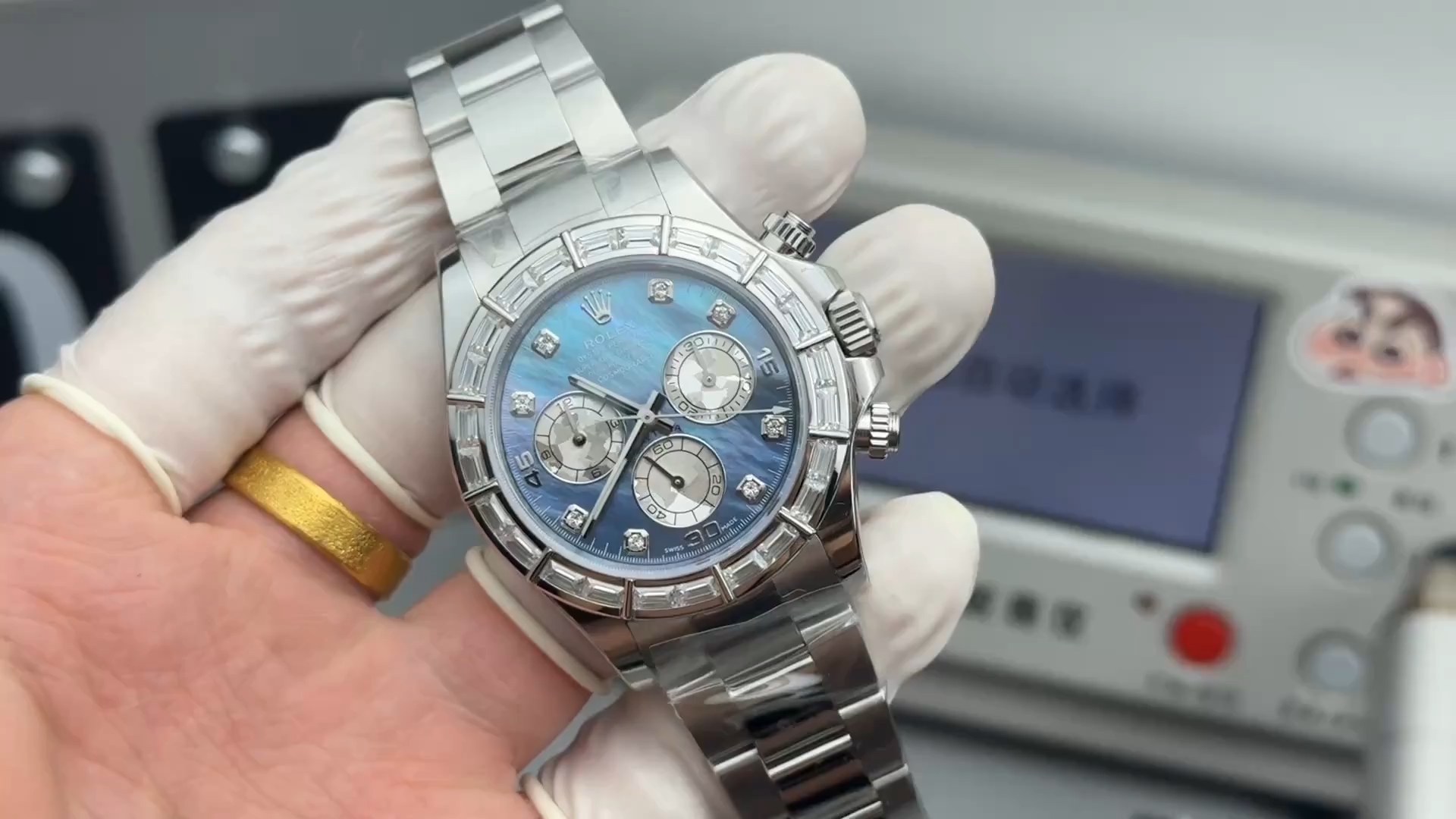 Rolex Daytona 116589BR, video showing the watch held in a gloved hand. - Video
