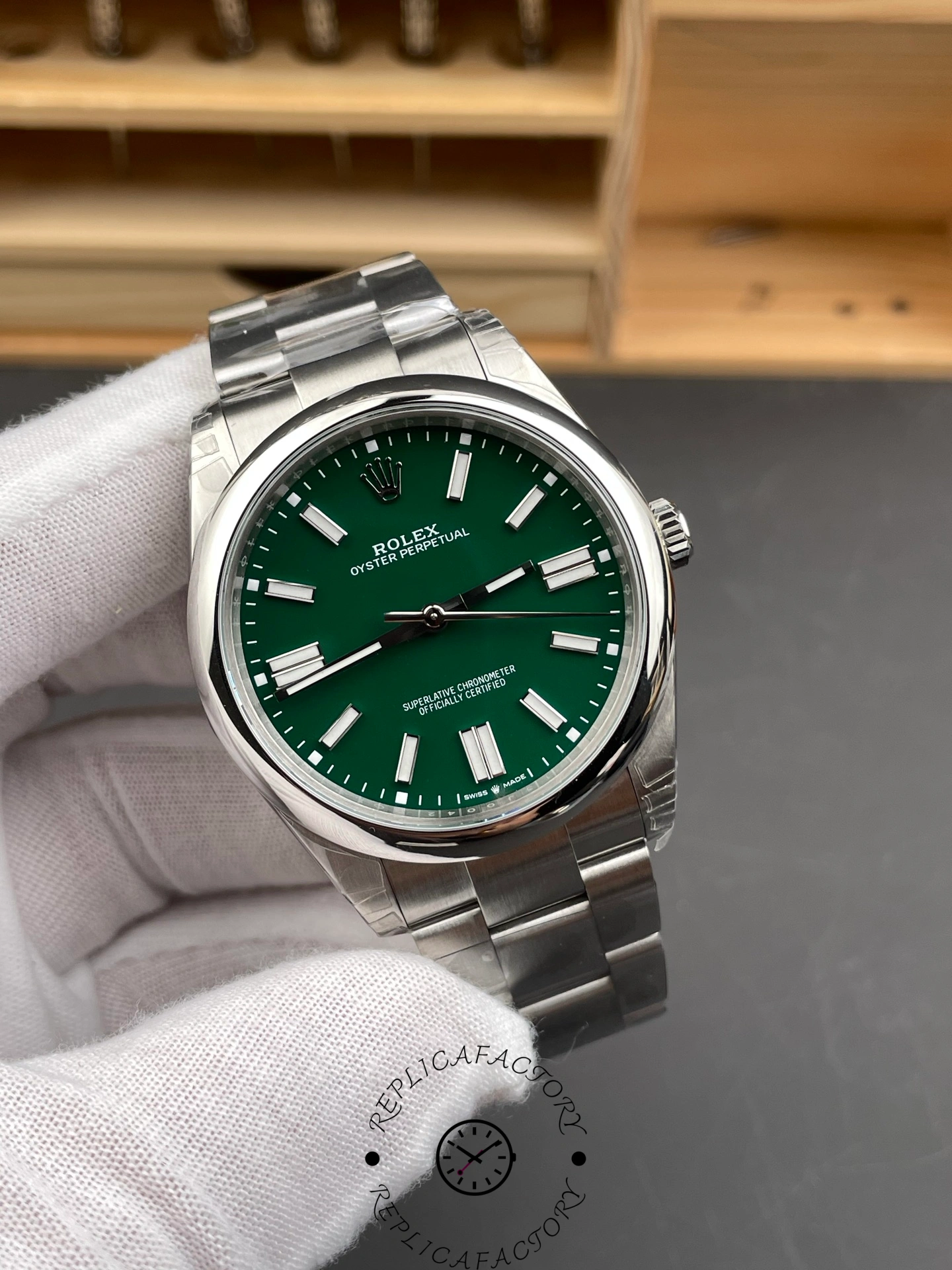 Angled view of Rolex Oyster Perpetual 134300 0004 highlighting the green dial and bezel.