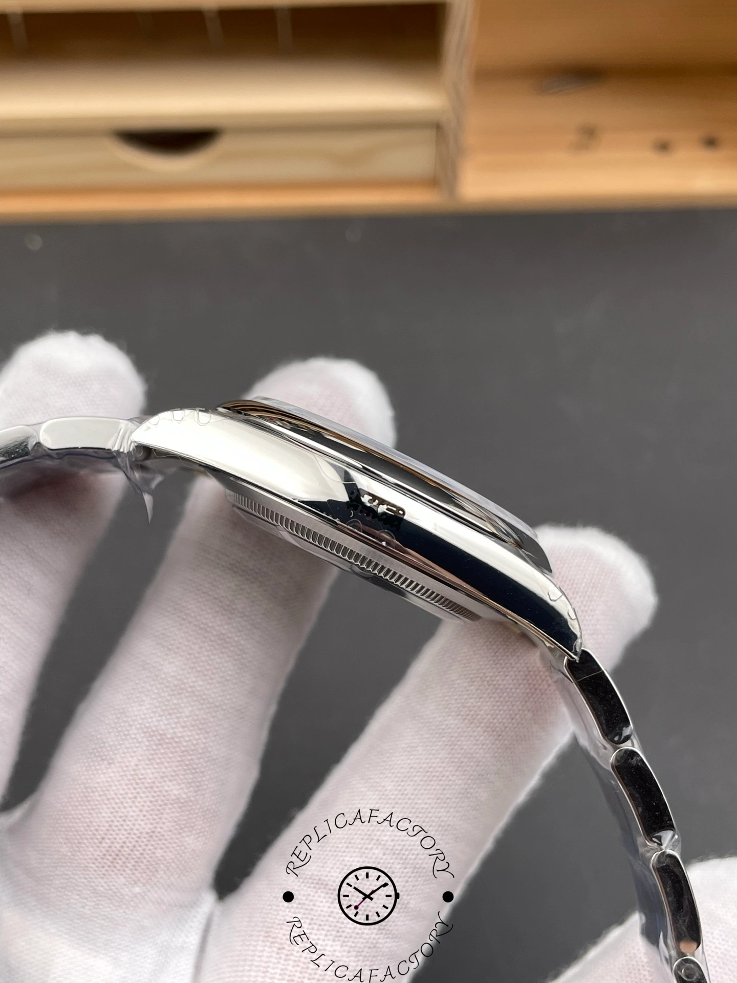Side profile of Rolex Oyster Perpetual 134300 0004 showing case thickness and lugs.