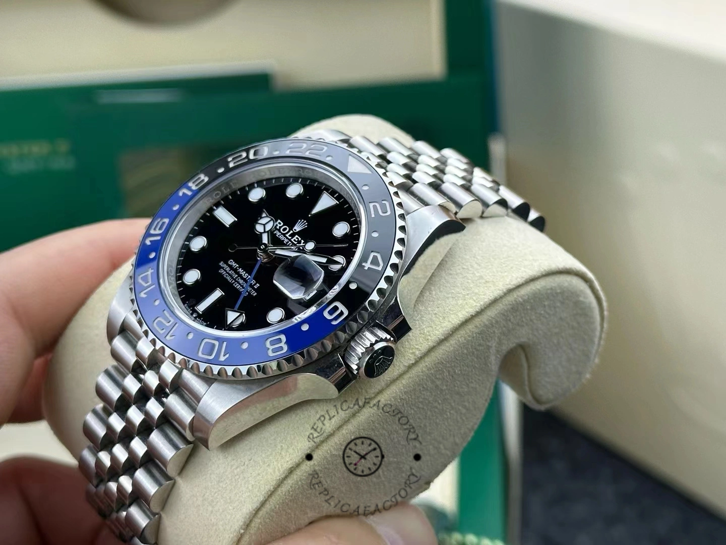 Side view of Rolex GMT-Master II 126710BLNR-0002 after one year, highlighting polished case and bezel reflection.
