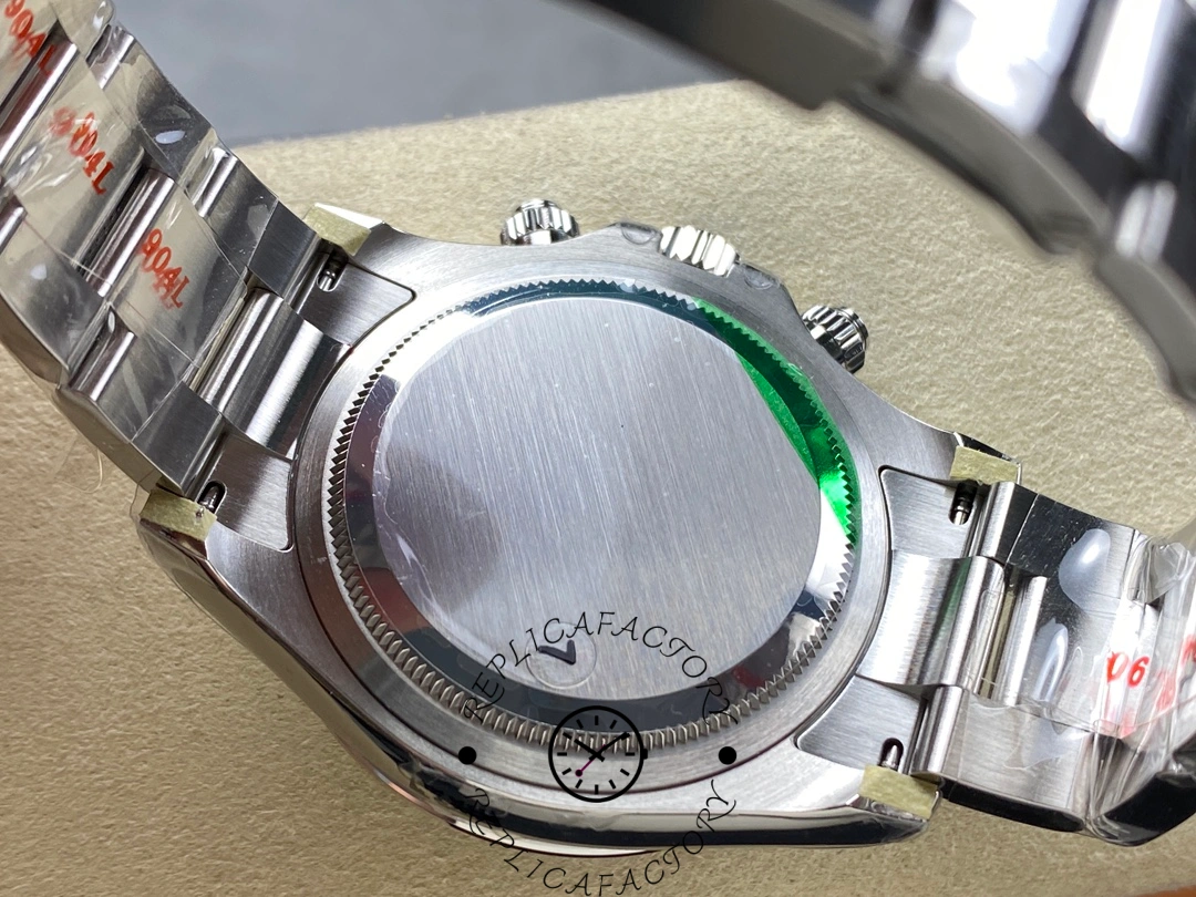 Caseback view of Rolex Cosmograph Daytona m126500ln-0002 showing solid back with green sticker.