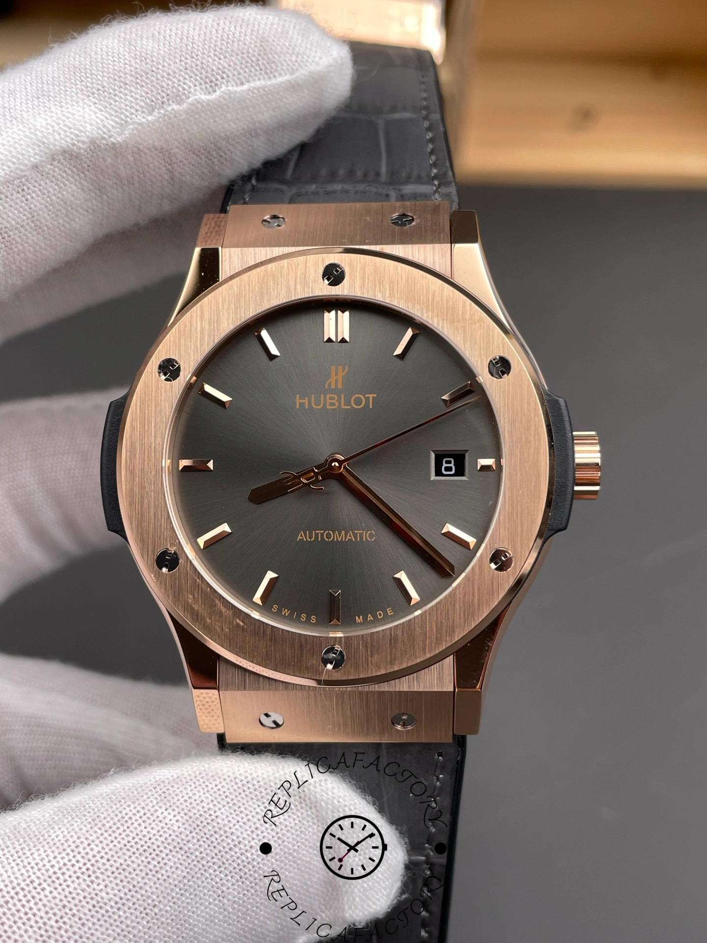 Close front angle of Hublot 511.OX.7081.LR showing sunray dial effect under light.