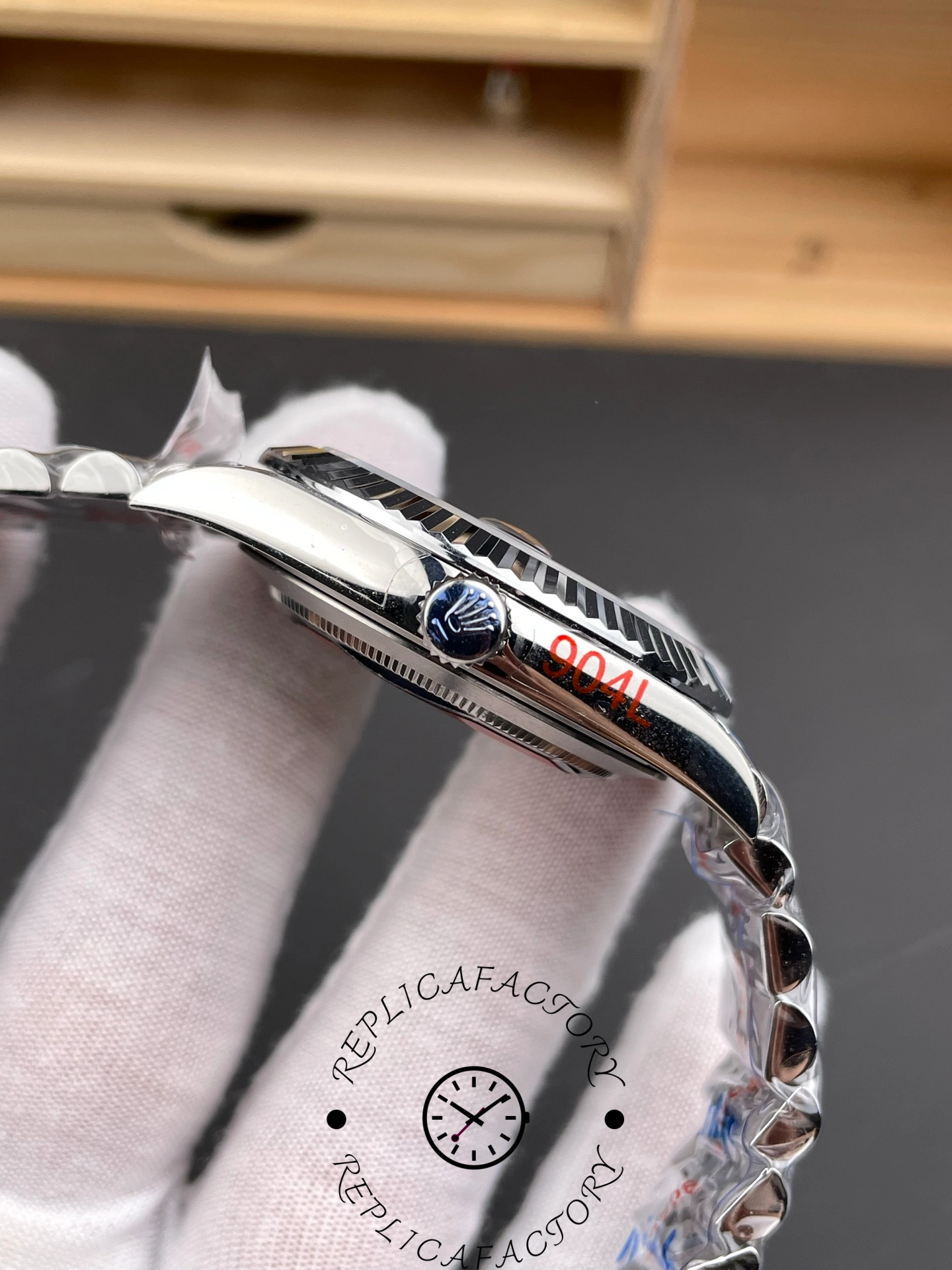 Side profile of the Rolex Datejust 126334-0018 showing the crown and bracelet curve.