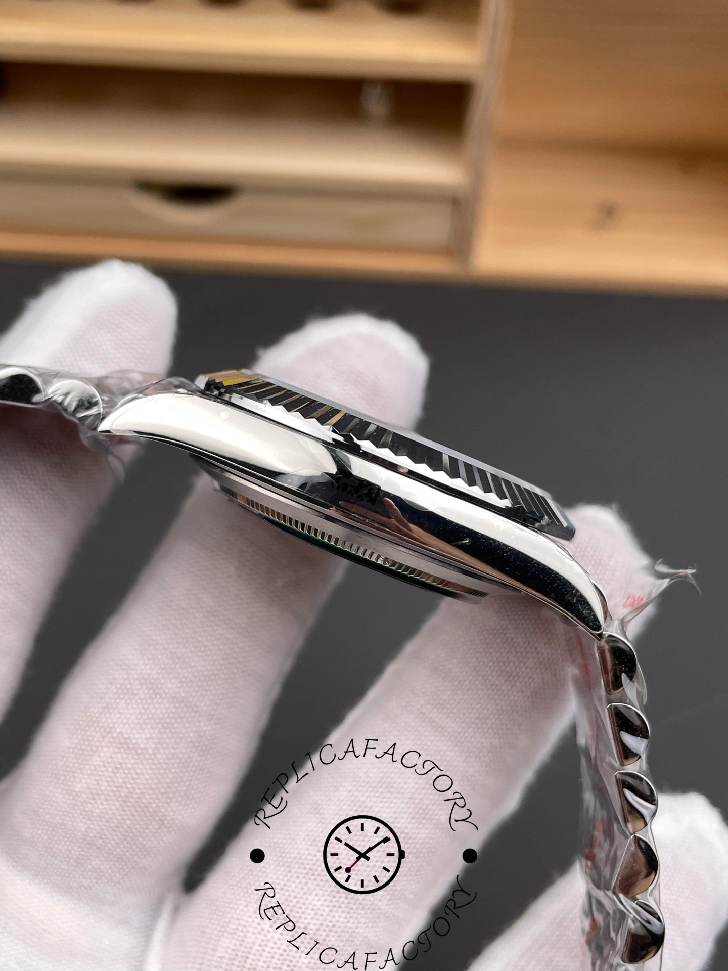 Opposite side view of the Rolex Datejust 126334-0018 showing the polished case and bezel edge.