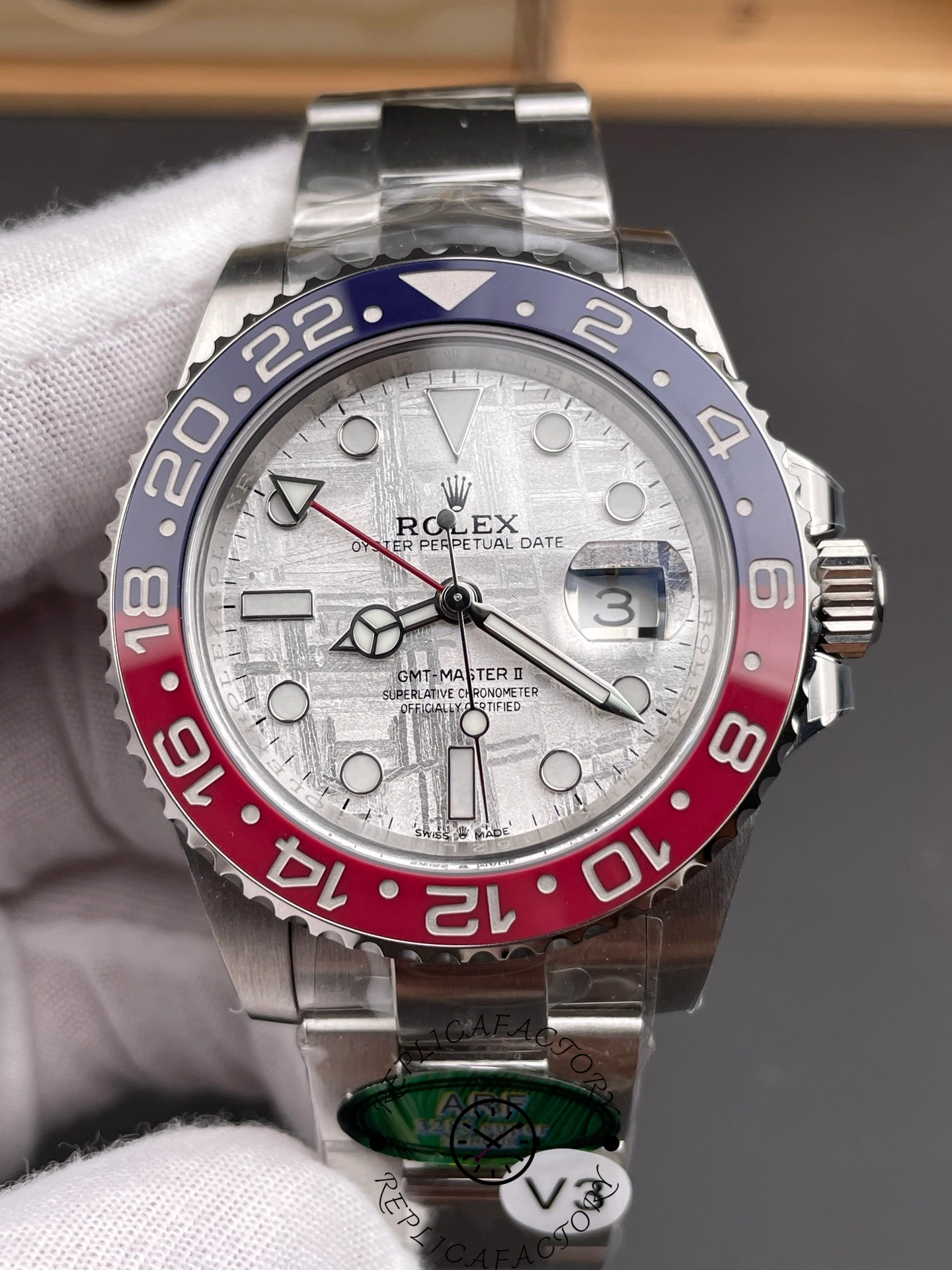 Rolex GMT-Master II 126719 0002 close front angle, meteorite dial texture, Pepsi bezel.