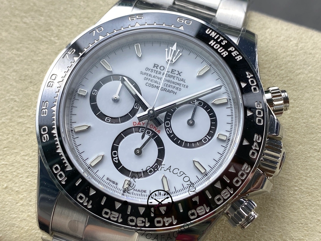 Rolex Daytona M126500LN-0001 angled close-up, Oystersteel case and black Cerachrom bezel.