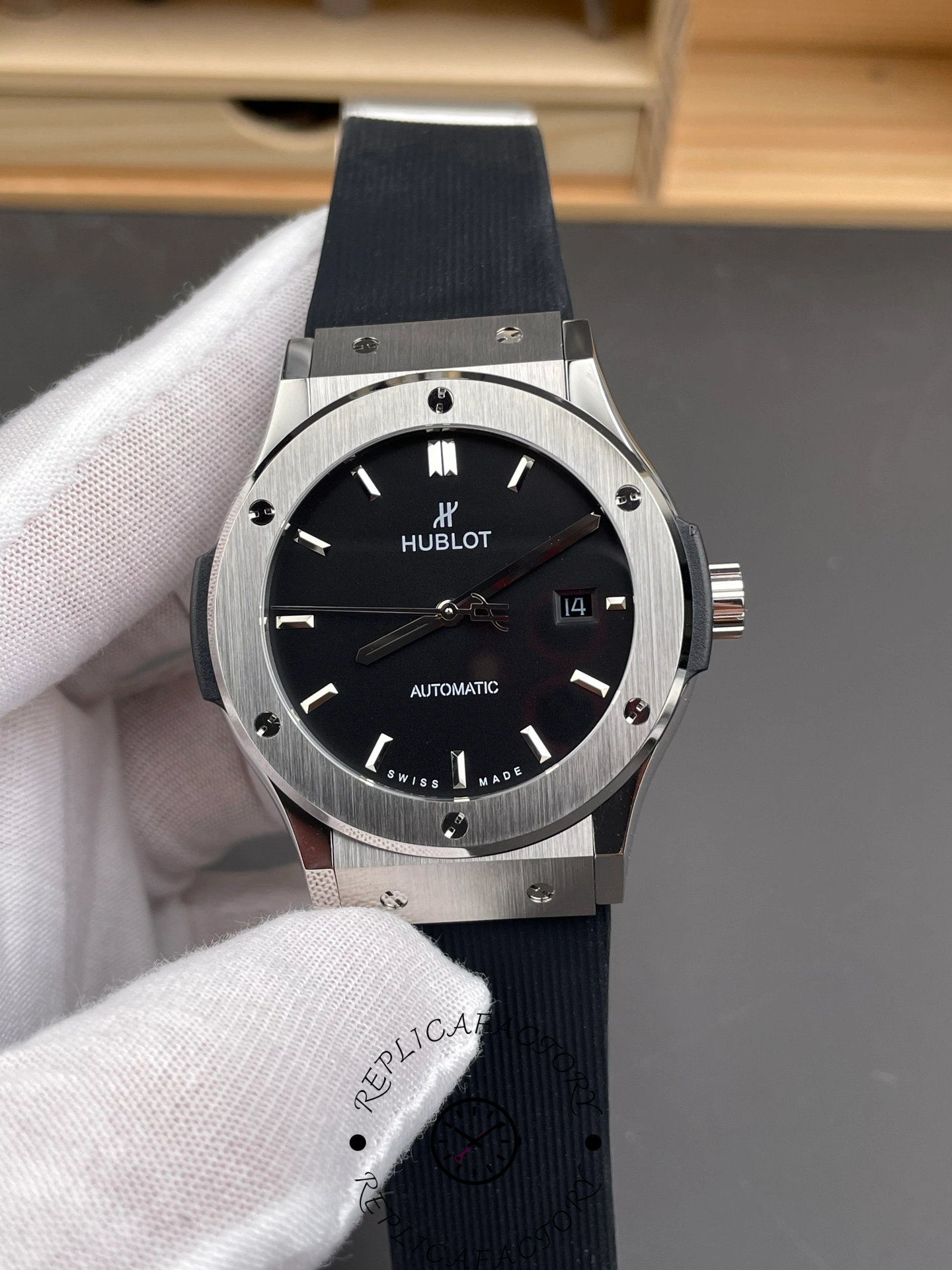 Front shot of Hublot Classic Fusion 542.NX.1171.RX, black dial centered with clean three-hand layout.