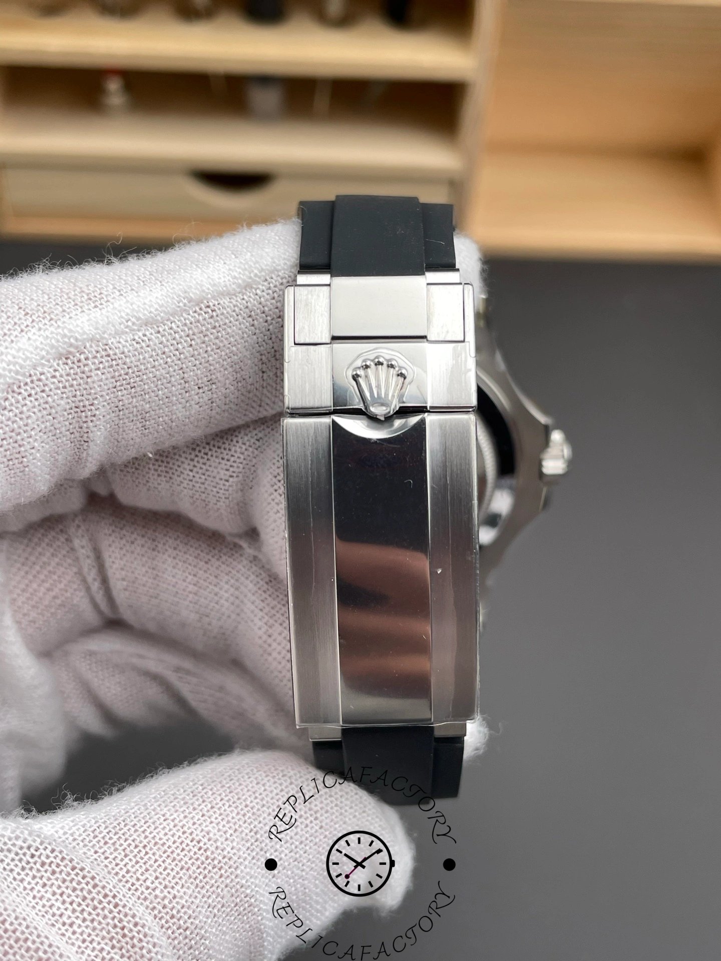 Rolex Yacht-Master 226659 clasp close-up, clasp and strap hardware detail, held in glove.