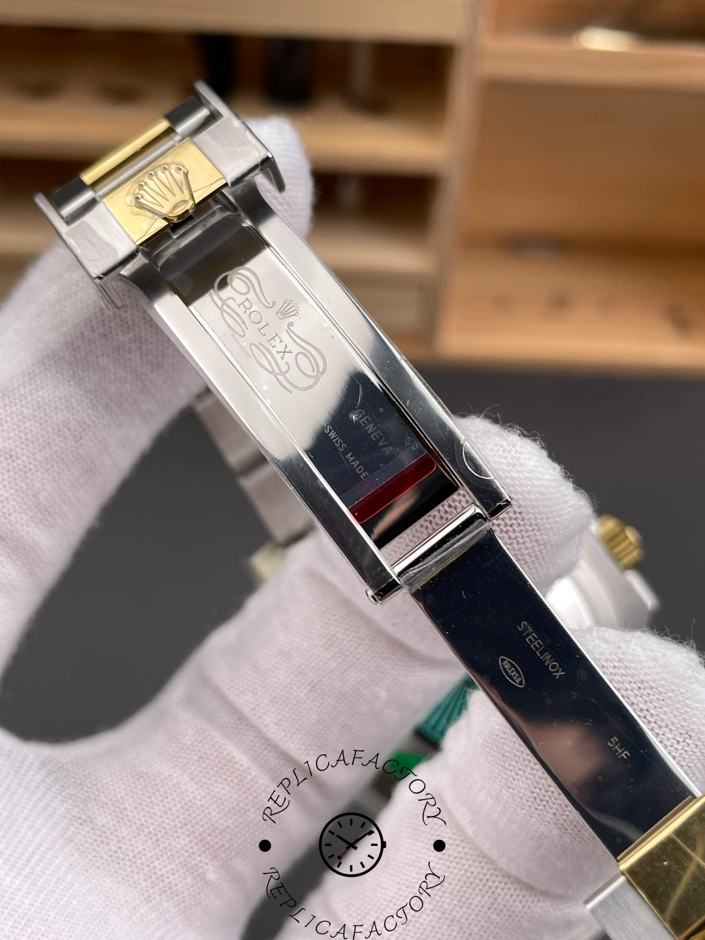 Rolex Submariner 126613LN 0002 clasp detail, extension area shown with tool pointer.