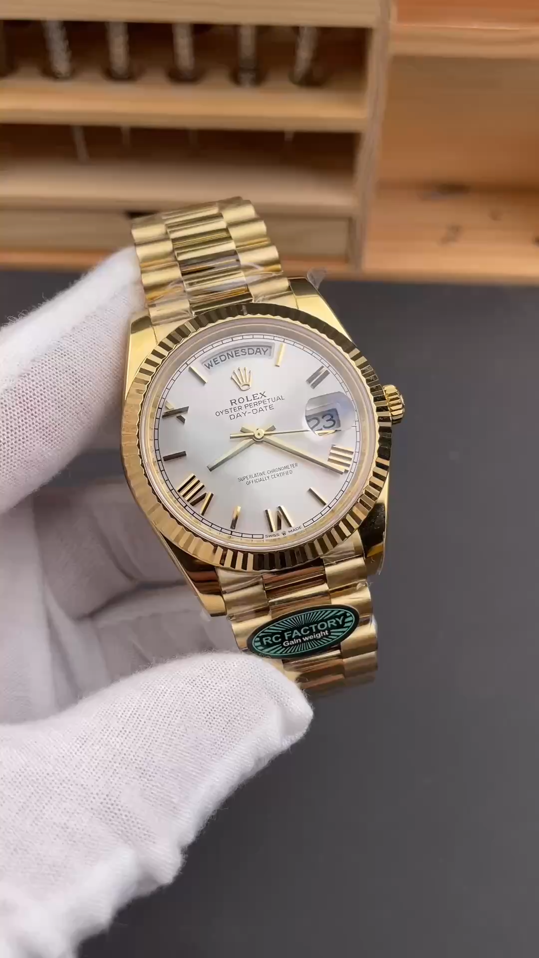 Video showing Rolex Day-Date 228238 on a gloved hand in vertical preview format. - Video