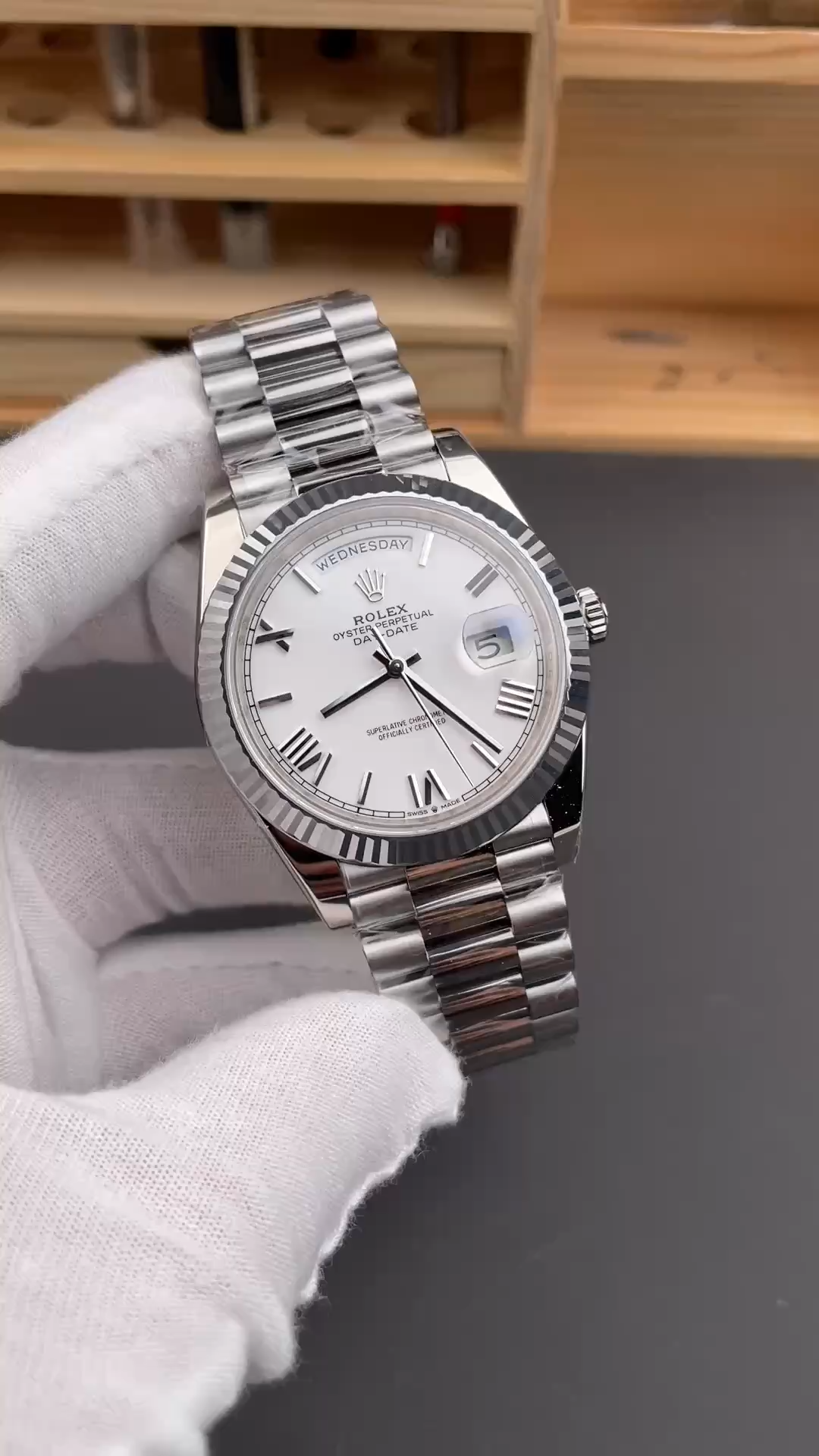 Video of Rolex Day-Date 228239 showing the bracelet and side profile in hand. - Video
