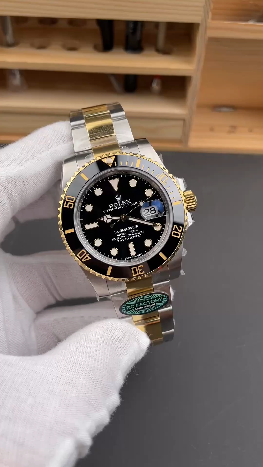 Rolex Submariner 126613LN 0002 video, hand-held front view showing black dial and bezel. - Video