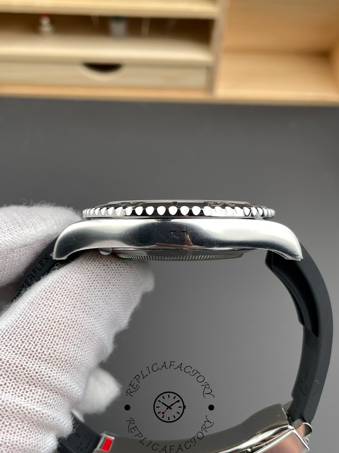 Rolex Yacht-Master 226659 side profile close-up, lug and strap fitment detail, in glove.