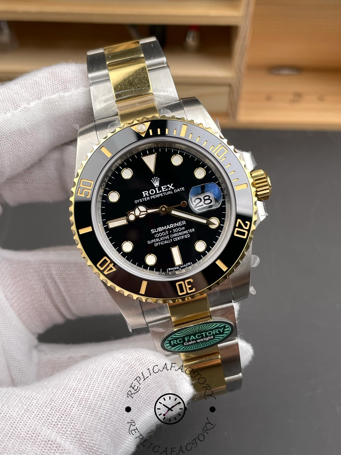 Rolex Submariner 126613LN 0002 angled wristwatch view, two-tone case and black bezel scale.