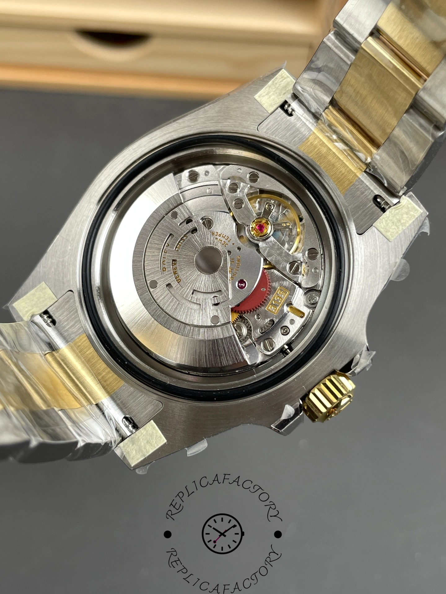 Rolex Submariner 126613LN 0002 caseback open view, movement rotor visible.