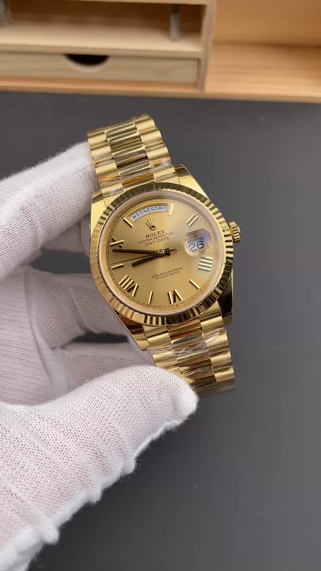 Video showing Rolex Day-Date 228238 on a gloved hand in vertical preview format. - Video