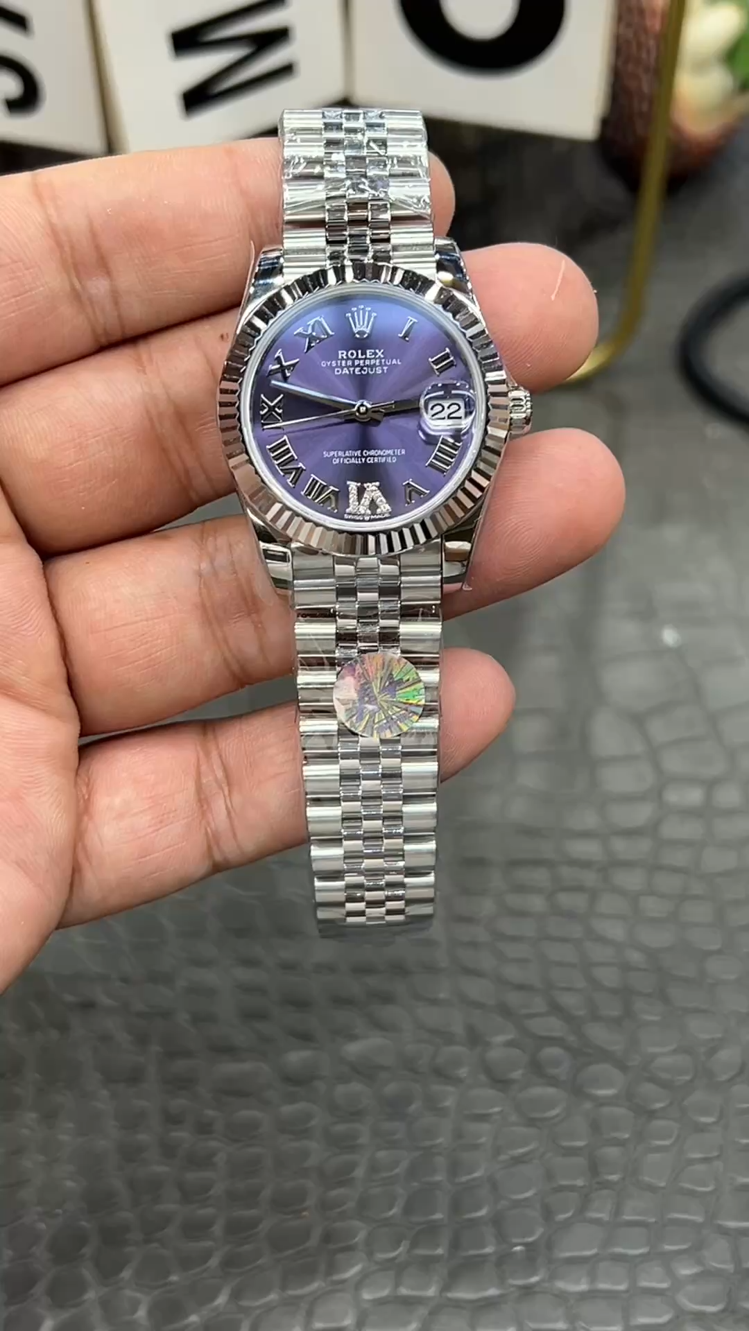 Video of Rolex Datejust 31 278274-0026 showing the watch held in hand from the front. - Video