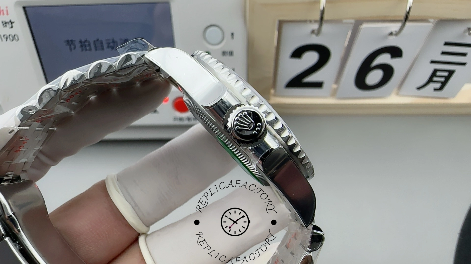 Rolex GMT-Master II 126710BLRO, crown-side view showing crown guards and case profile.