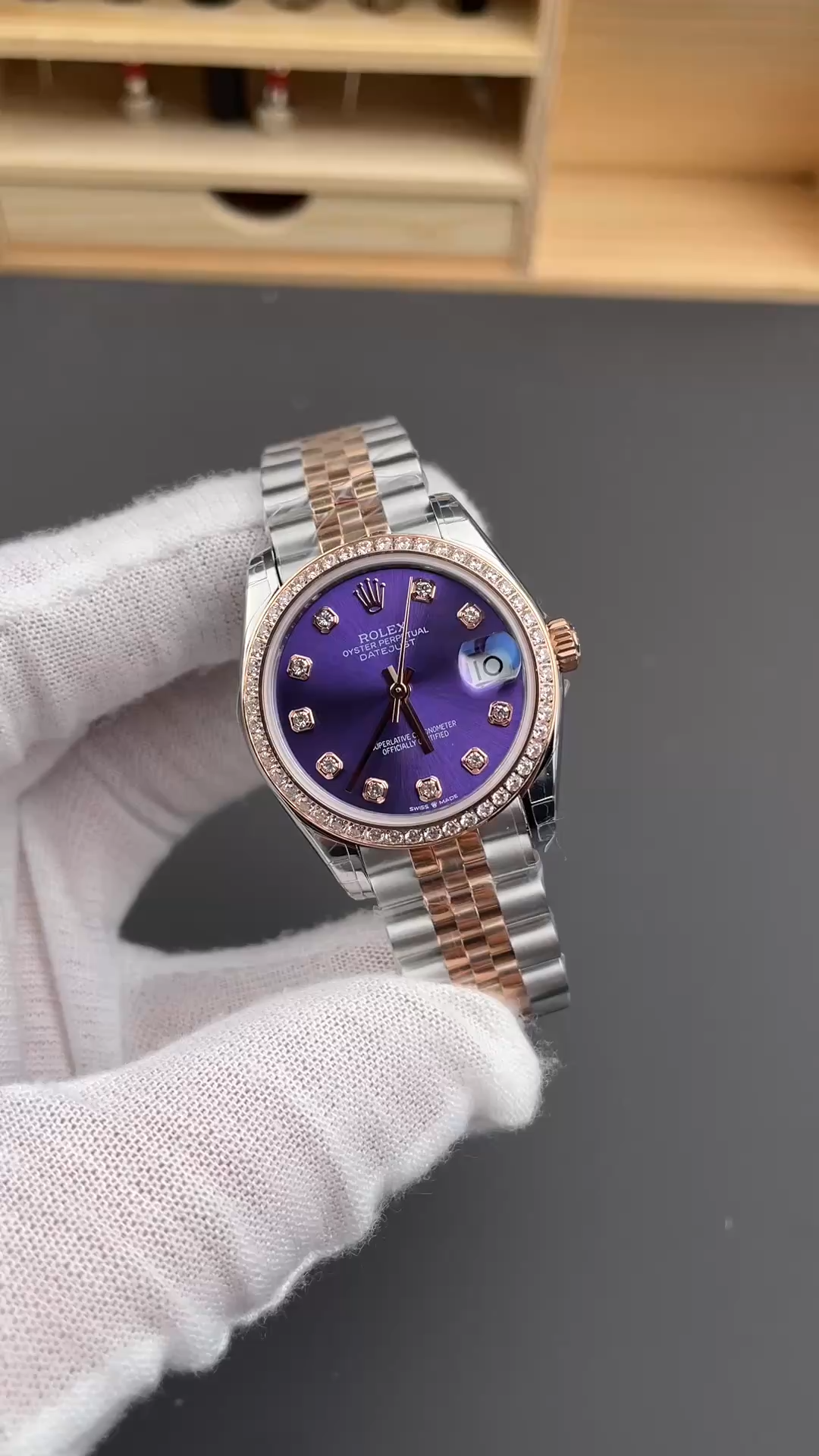 Handheld view of the Rolex Datejust m279381rbr-0015 with aubergine diamond dial and diamond bezel. - Video