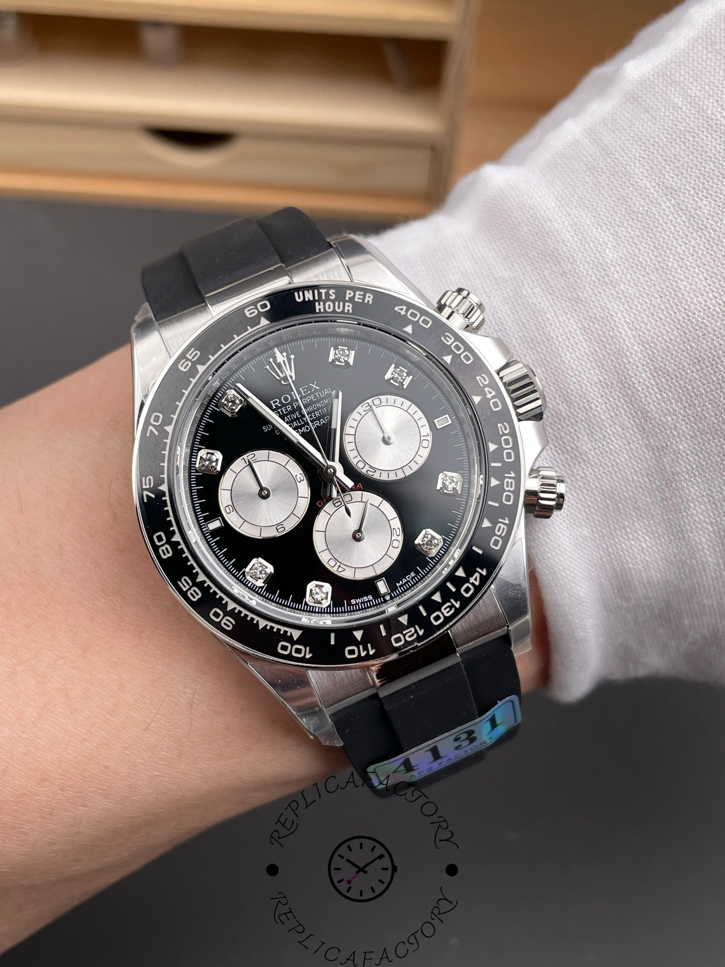 Wrist shot of the Rolex Cosmograph Daytona White Gold 126519LN 0004 showing full dial view.