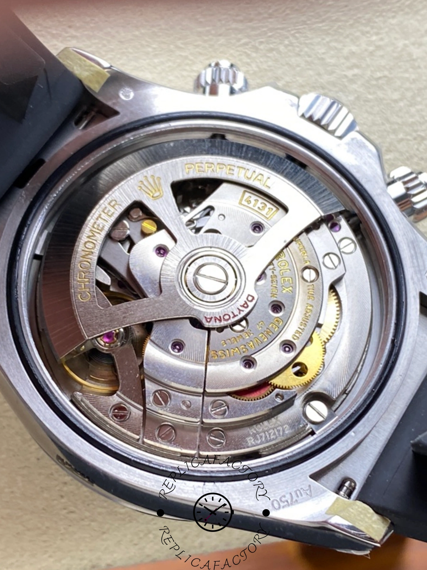Movement view of the Rolex Cosmograph Daytona White Gold 126519LN 0004 showing rotor and gears.