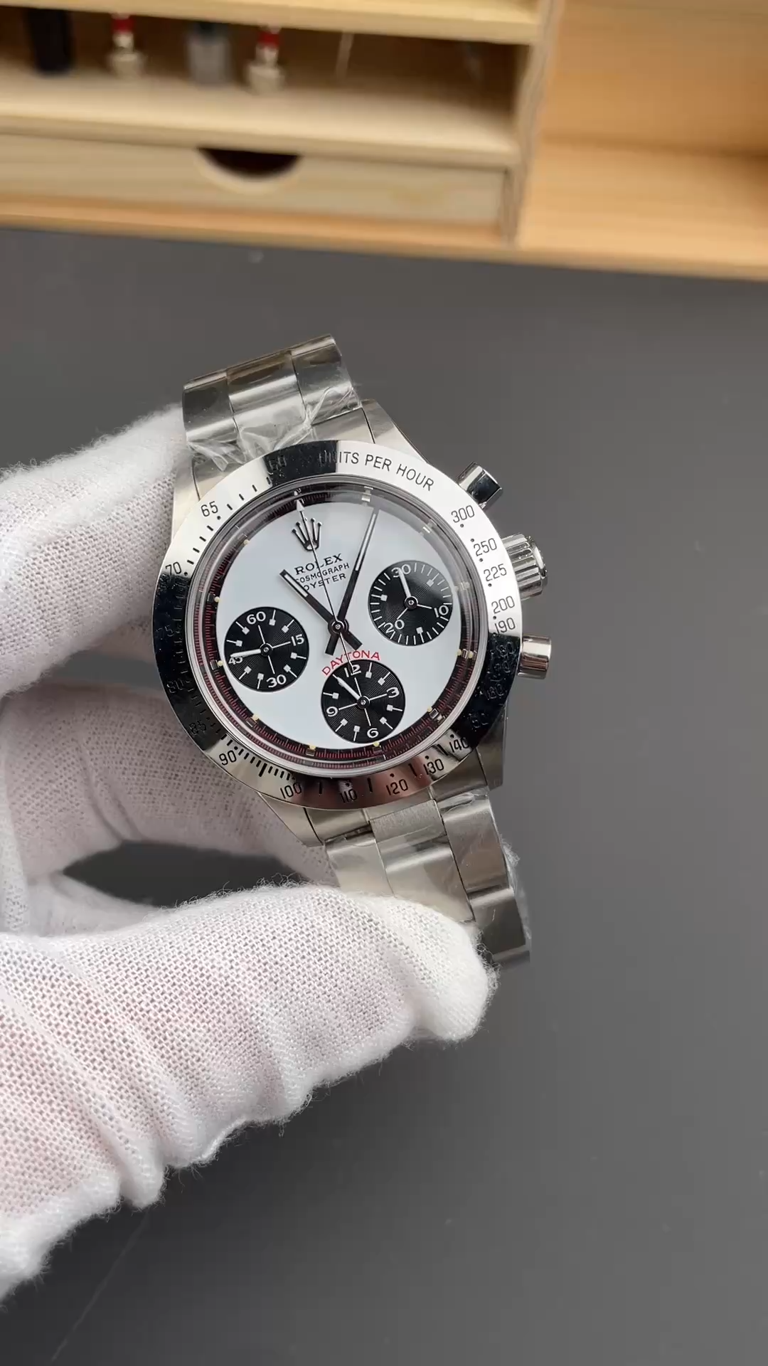 Rolex Daytona 6239, in-hand video showing the white dial and stainless steel bracelet. - Video