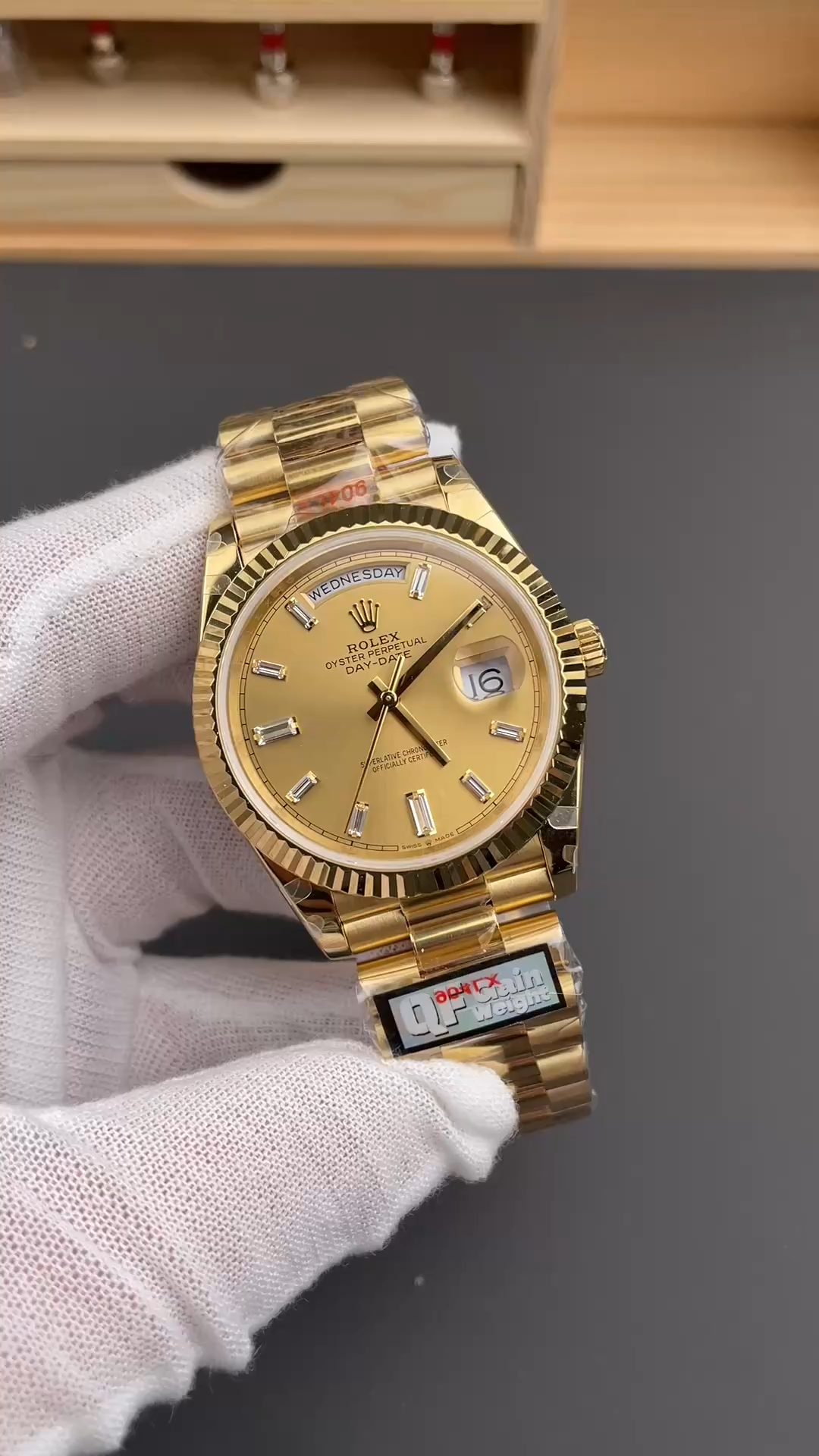 Handheld view of the Rolex Day-Date m228238-0005 with champagne dial and yellow gold bracelet. - Video