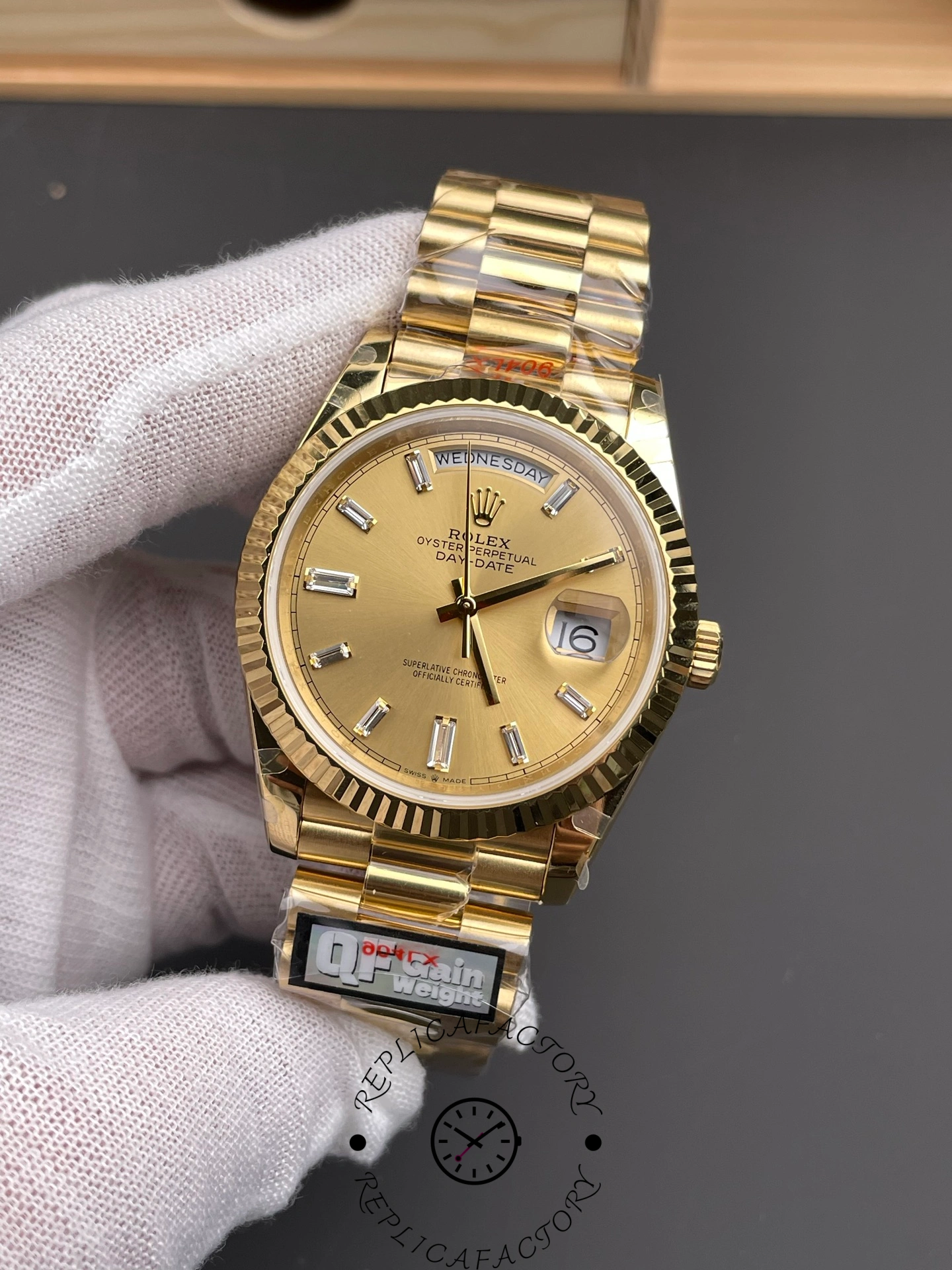 Straight-on view of the Rolex Day-Date m228238-0005 with champagne dial and President bracelet.