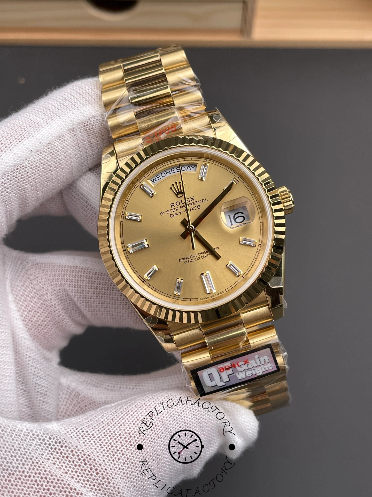 Angled front view of the Rolex Day-Date m228238-0005 showing the champagne dial and fluted bezel.