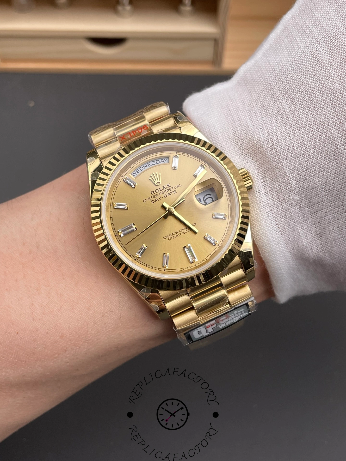 Wrist shot of the Rolex Day-Date m228238-0005 with champagne dial and yellow gold case.