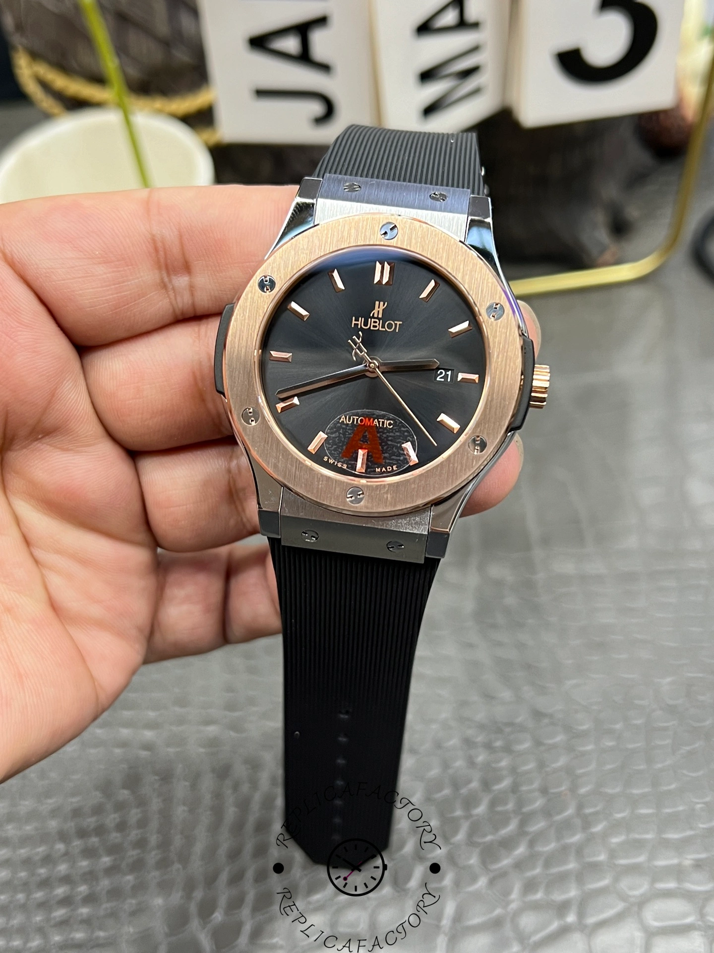 Another handheld angle of Hublot Classic Fusion 542.NO.1181.RX showing dial reflections and case finish.