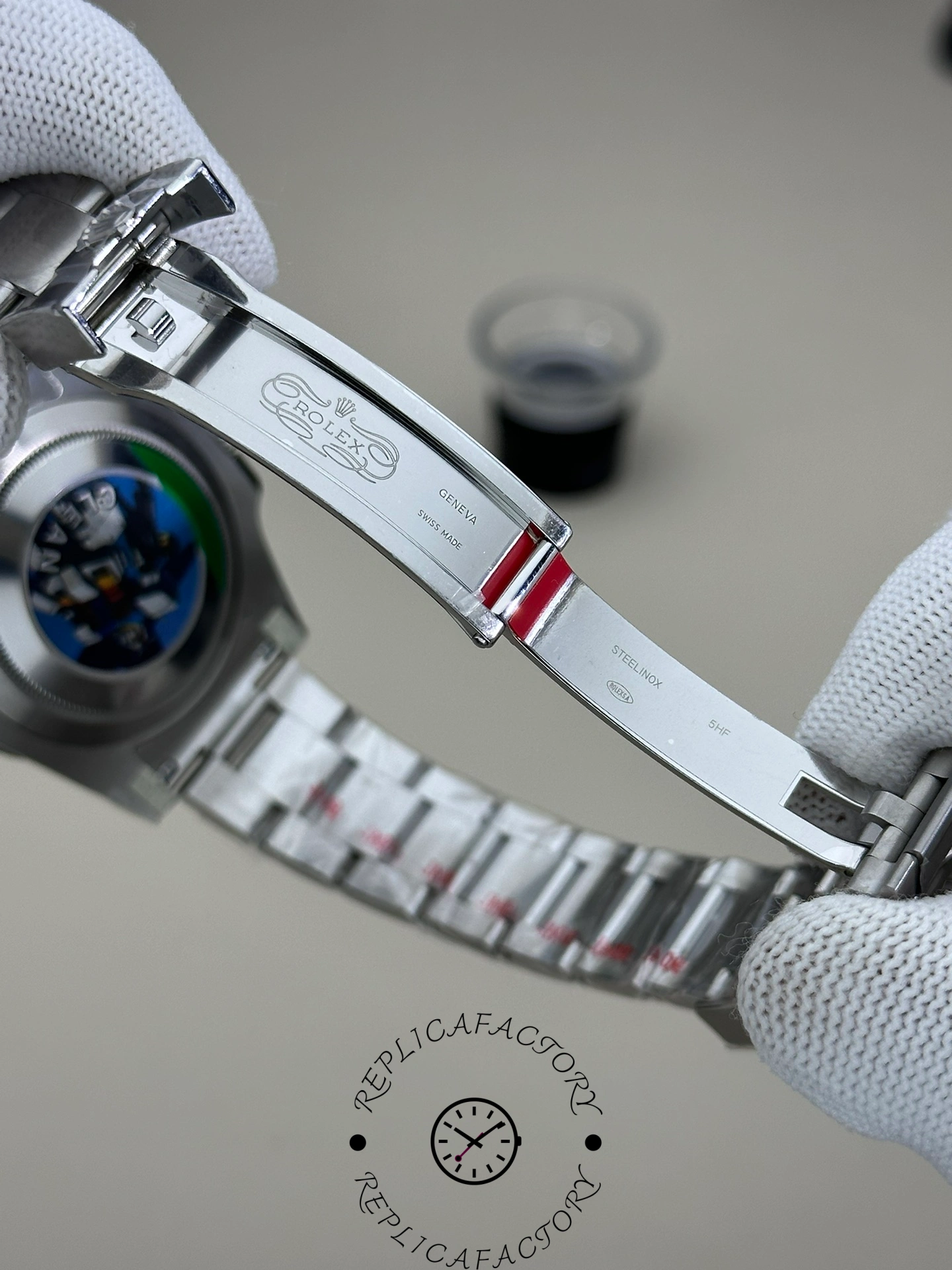 Rolex Submariner 116610LN clasp open view, Oyster links and safety lock visible.