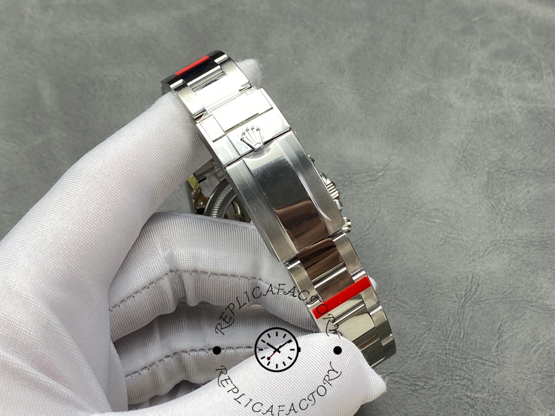 Bracelet detail of Rolex Platinum Daytona 126506 showing protective stickers on links.