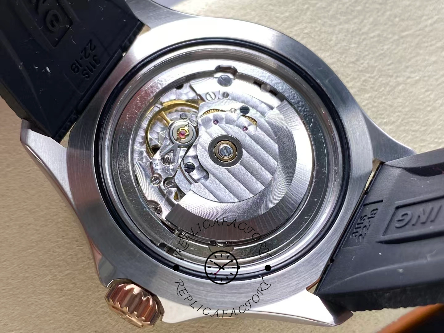 Breitling Superocean A17376211B1S1, exhibition caseback close-up showing rotor and movement.