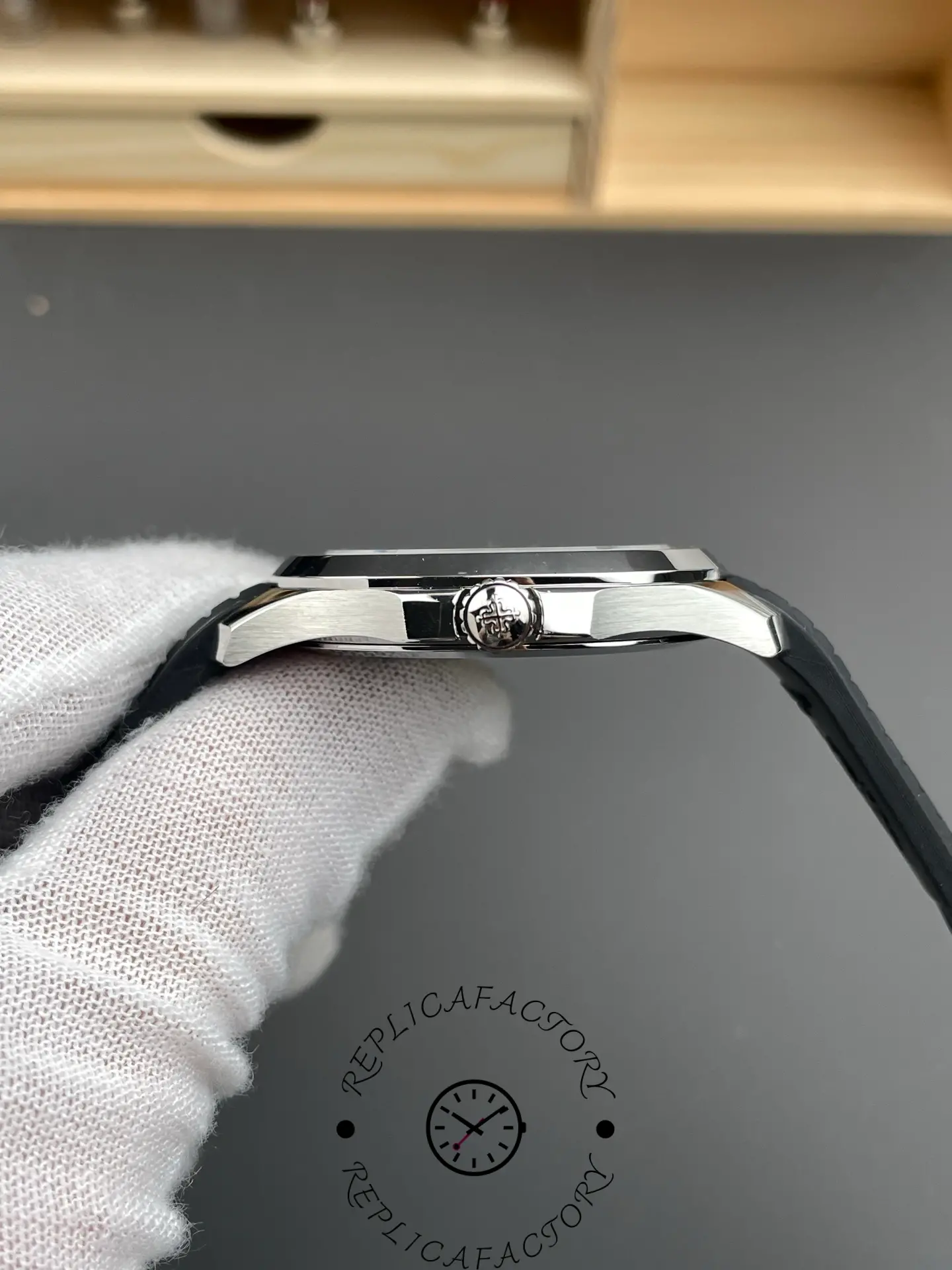 Side profile of Patek Philippe Aquanaut 5167A-001 showing slim case thickness and crown position.