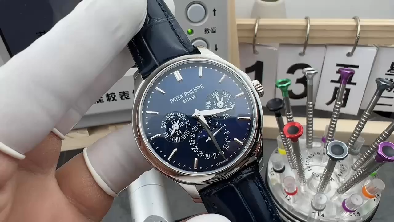 Video: hand-held Patek Philippe 5140P-001 showing blue dial shine and polished case finish. - Video
