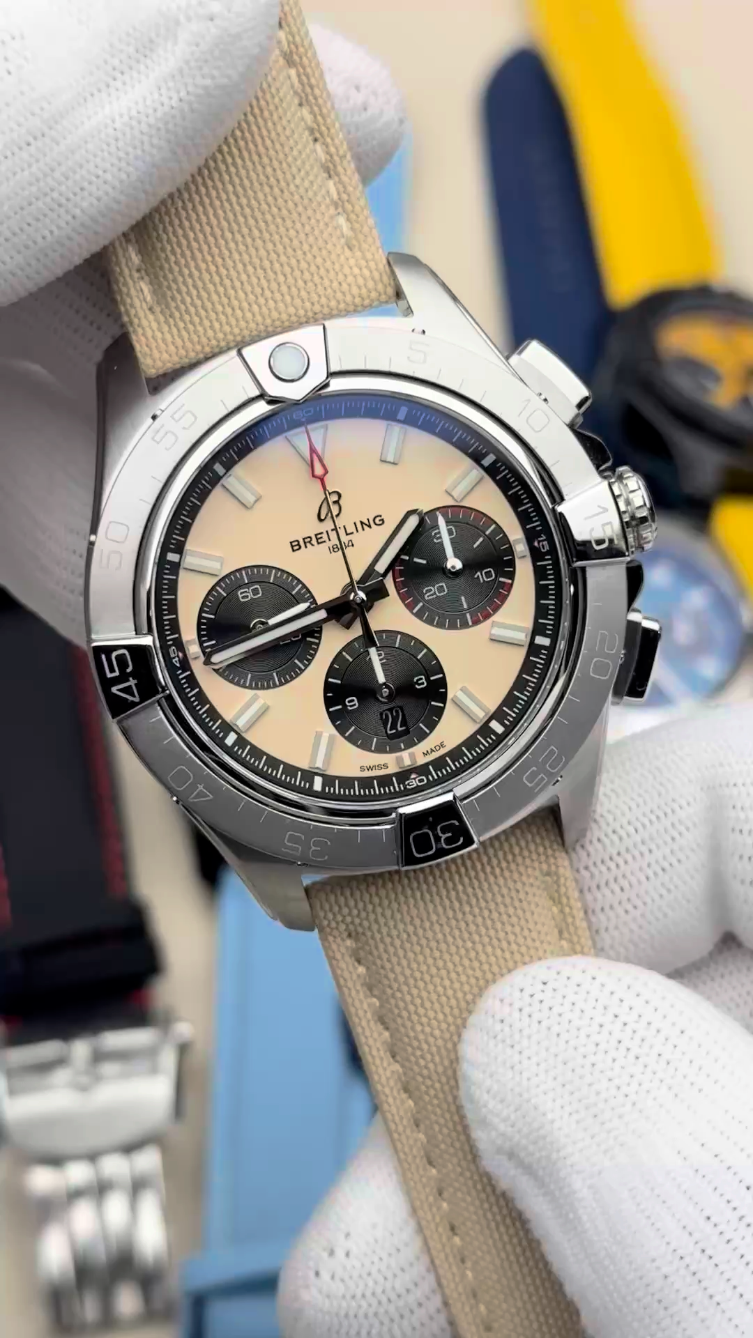 Angled view of Breitling Avenger B01 Chronograph 44 AB0147101A1X1 highlighting the bezel and chronograph layout. - Video