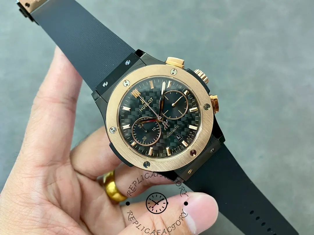Wrist shot in hand: Hublot Classic Fusion 521.CO.1781.RX showing full watch on black strap.