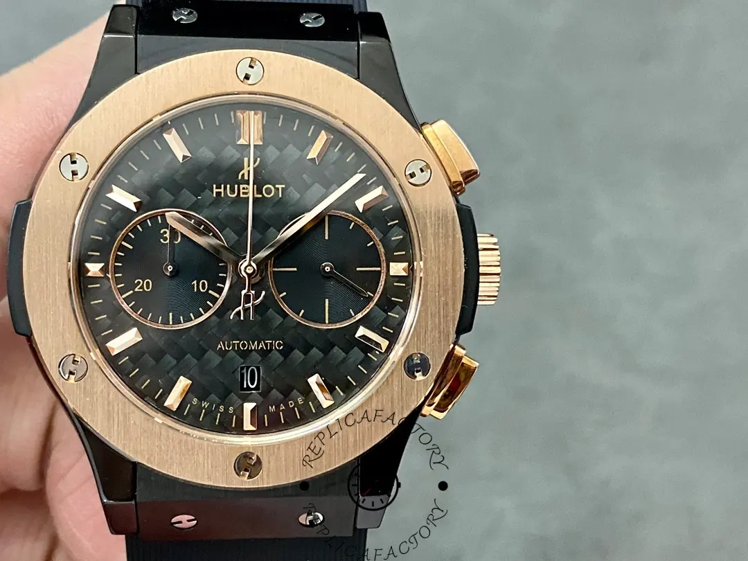 Front view of Hublot Classic Fusion 521.CO.1781.RX showing black dial and rose gold bezel in hand.